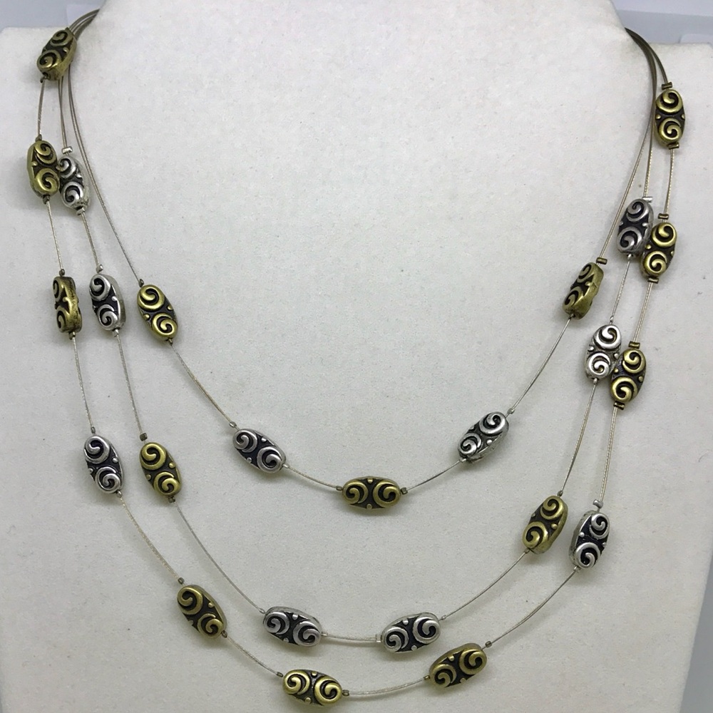 NWOT Premier Designs “Carried Away” silver/gold necklace